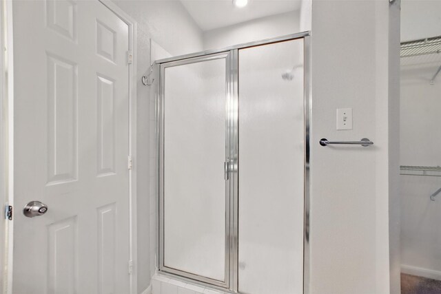 1330 Old Spanish Trl Unit 7207, Houston, TX 77054 - full bathroom with a shower stall and a spacious closet
