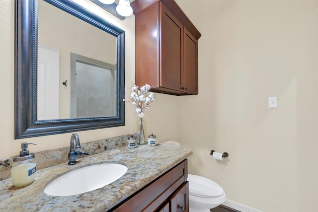 607 29th St, Dickinson, TX 77539 - bathroom with vanity and toilet