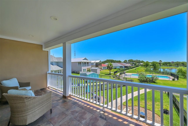 607 29th St, Dickinson, TX 77539 - balcony with a residential view and a water view