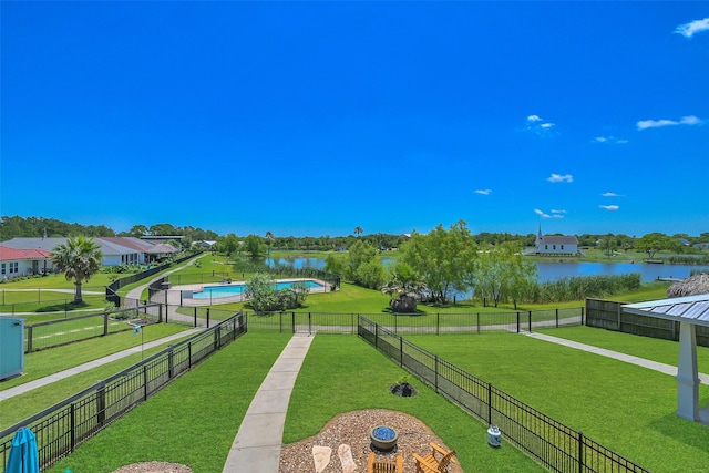 607 29th St, Dickinson, TX 77539 - view of home's community featuring a pool and a water view