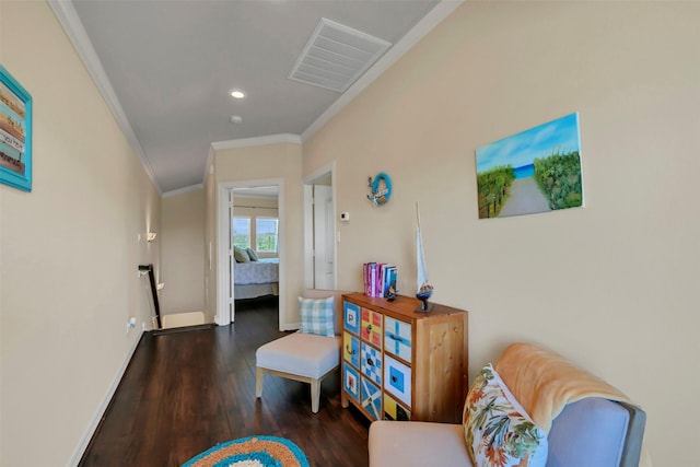 607 29th St, Dickinson, TX 77539 - sitting room with ornamental molding, wood finished floors, baseboards, and recessed lighting