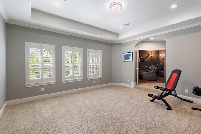 27433 S Lazy Meadow Way, Spring, TX 77386 - workout area featuring a tray ceiling, arched walkways, carpet floors, baseboards, and recessed lighting