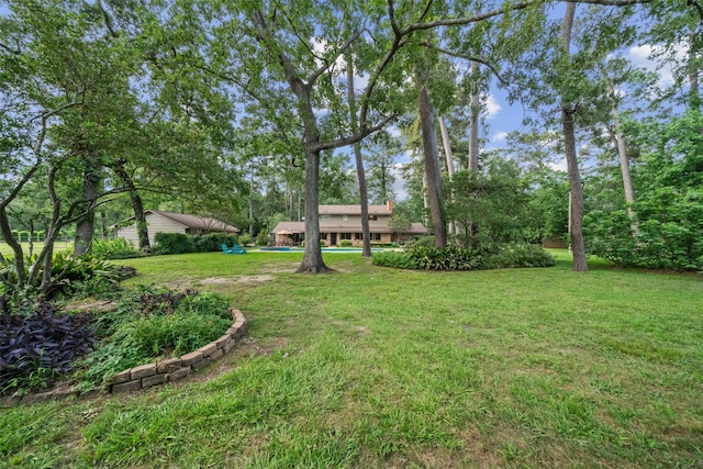 1710 Magnolia Ln, Kingwood, TX 77339 - view of grassy yard