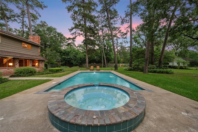 1710 Magnolia Ln, Kingwood, TX 77339 - view of pool featuring a lawn and a pool with connected hot tub