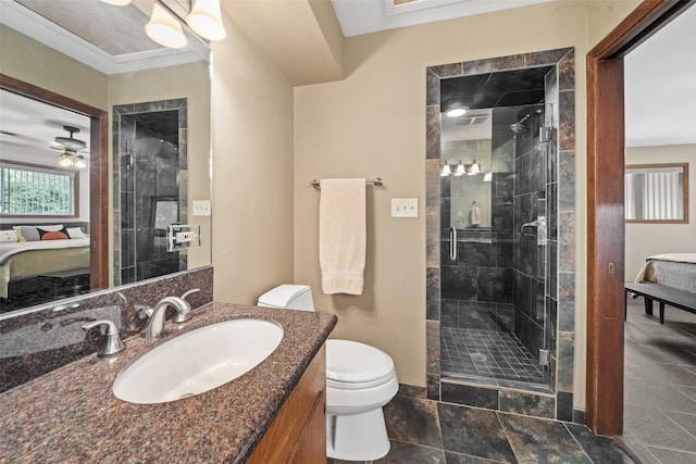 1710 Magnolia Ln, Kingwood, TX 77339 - ensuite bathroom featuring vanity, toilet, a shower stall, and baseboards