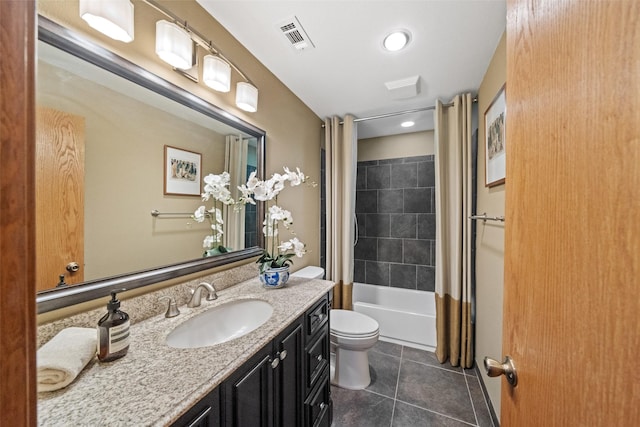 1710 Magnolia Ln, Kingwood, TX 77339 - bathroom with vanity, tile patterned floors, toilet, and shower / bath combo