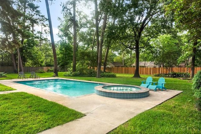 1710 Magnolia Ln, Kingwood, TX 77339 - view of pool with a patio and a pool with connected hot tub