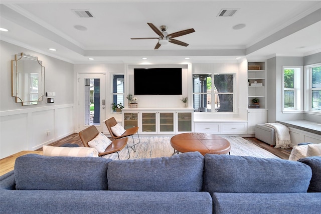 1345 Curtin St, Houston, TX 77018 - living area with wood finished floors, ornamental molding, a ceiling fan, wainscoting, and recessed lighting