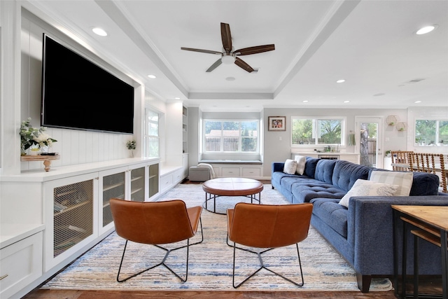 1345 Curtin St, Houston, TX 77018 - living area featuring plenty of natural light, ceiling fan, wood finished floors, recessed lighting, and a tray ceiling