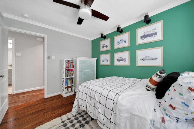1345 Curtin St, Houston, TX 77018 - bedroom featuring wood finished floors, crown molding, baseboards, and ceiling fan