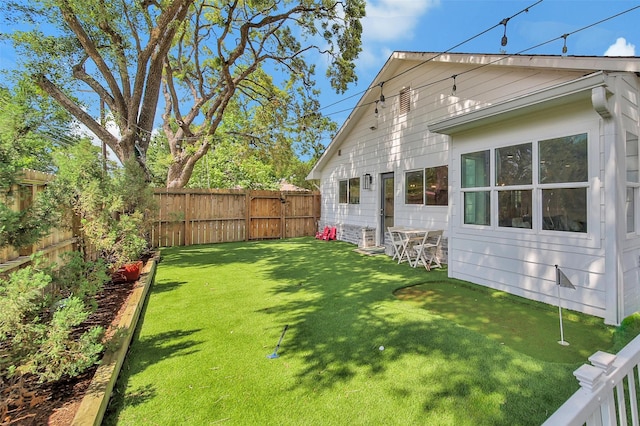 1345 Curtin St, Houston, TX 77018 - view of yard with a putting green