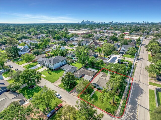 1345 Curtin St, Houston, TX 77018 - aerial overview of property's location featuring property parcel outlined and a view of skyline