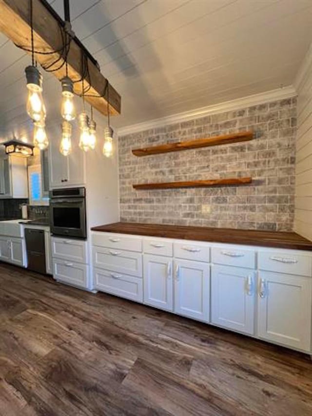 225 Lexington Dr, Vidor, TX 77662 - bar area with oven, dark wood-style floors, crown molding, dishwasher, and decorative light fixtures