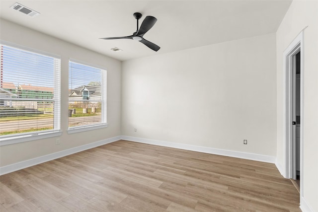 3475 Simmons St, Houston, TX 77004 - spare room featuring light wood-type flooring, baseboards, and ceiling fan