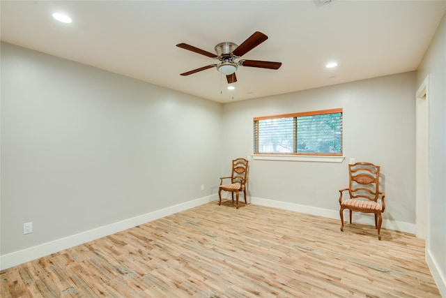 4438 Wigton Dr, Houston, TX 77096 - sitting room with wood finished floors, a ceiling fan, recessed lighting, and baseboards