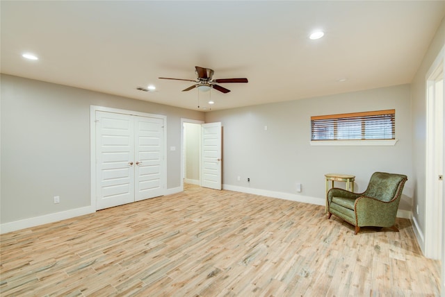 4438 Wigton Dr, Houston, TX 77096 - sitting room featuring a ceiling fan, light wood-style floors, recessed lighting, and baseboards