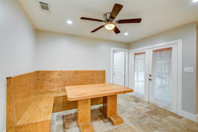 4438 Wigton Dr, Houston, TX 77096 - unfurnished dining area with recessed lighting, french doors, ceiling fan, stone finish floors, and baseboards