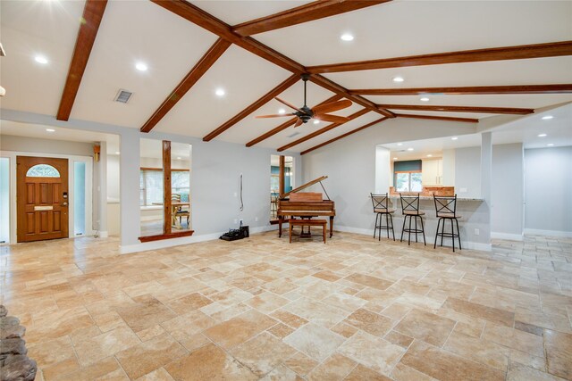 4438 Wigton Dr, Houston, TX 77096 - living room featuring stone tile flooring, baseboards, recessed lighting, a ceiling fan, and plenty of natural light