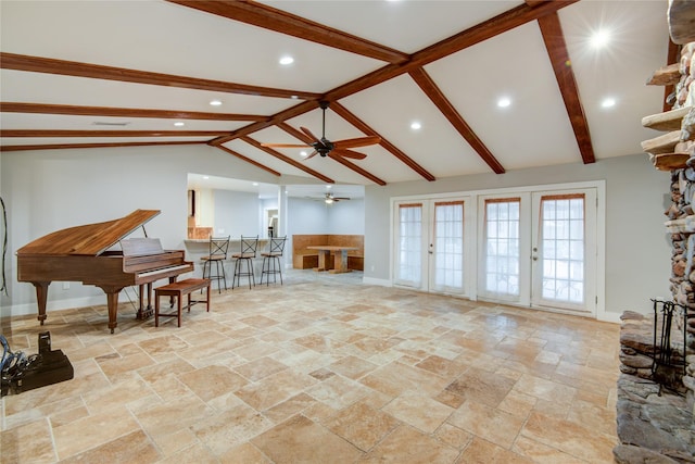 4438 Wigton Dr, Houston, TX 77096 - living room with a ceiling fan, stone tile flooring, recessed lighting, and baseboards