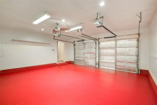 4438 Wigton Dr, Houston, TX 77096 - garage with a garage door opener, baseboards, and recessed lighting