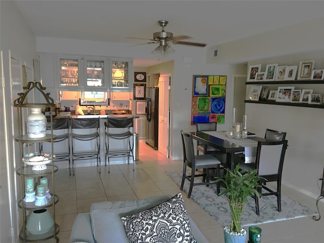 4747 Nasa Pkwy Unit 104, Pasadena, TX 77586 - dining space with a ceiling fan and light tile patterned flooring