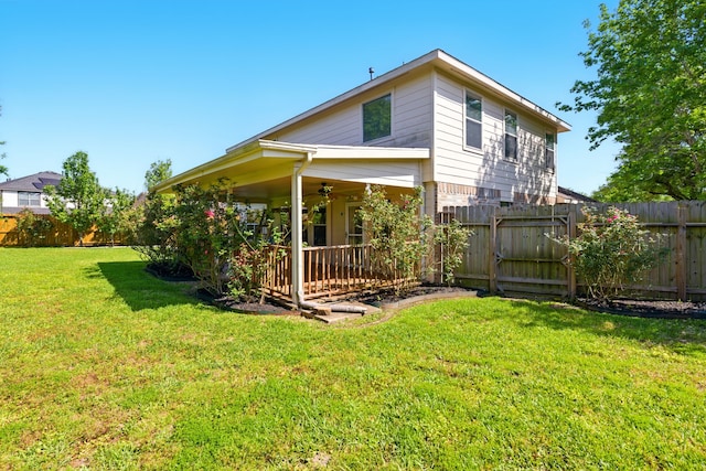 7918 Swan Ln, Baytown, TX 77523 - rear view of property featuring a ceiling fan