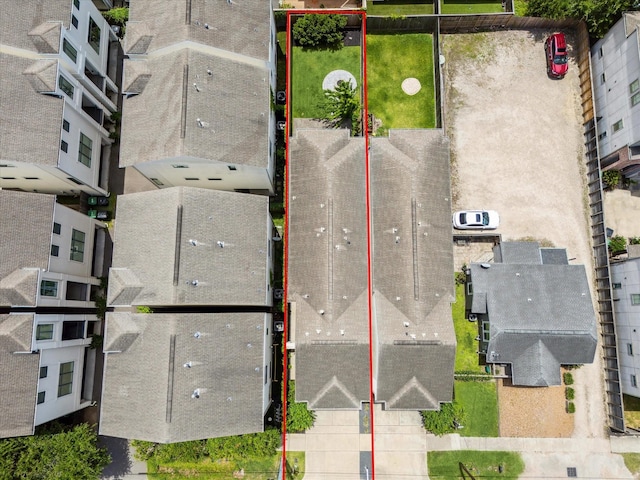 aerial view of property and surrounding area featuring property parcel outlined