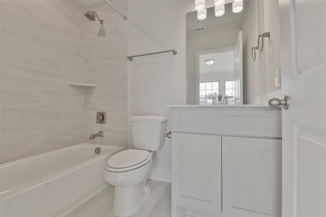 13140 Soaring Forest Dr, Conroe, TX 77302 - full bath with toilet, vanity, bathtub / shower combination, tile patterned flooring, and baseboards