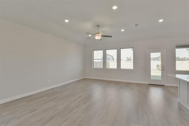 13140 Soaring Forest Dr, Conroe, TX 77302 - unfurnished room with ceiling fan, light wood finished floors, baseboards, and recessed lighting