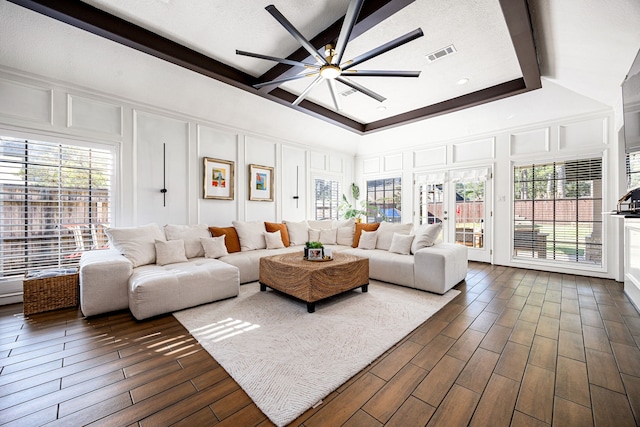 16019 Mickleham Dr, Spring, TX 77379 - living area featuring a decorative wall, ceiling fan, dark wood-type flooring, and plenty of natural light