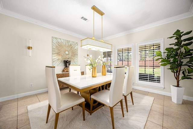 16019 Mickleham Dr, Spring, TX 77379 - dining space featuring light tile patterned floors, ornamental molding, and baseboards
