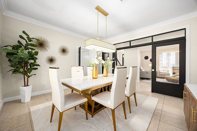 16019 Mickleham Dr, Spring, TX 77379 - dining area featuring light tile patterned flooring, ornamental molding, and baseboards