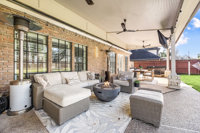 16019 Mickleham Dr, Spring, TX 77379 - view of patio featuring an outdoor living space with a fire pit, fence, and ceiling fan