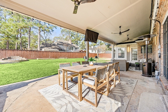 16019 Mickleham Dr, Spring, TX 77379 - view of patio featuring ceiling fan, outdoor dining space, and an outdoor living space