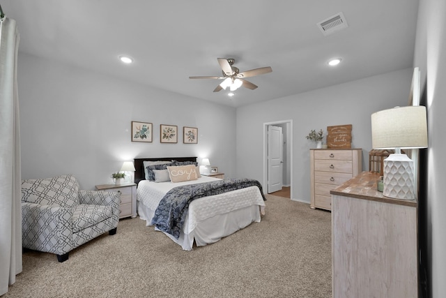 9040 Pecos Pl, Willis, TX 77378 - bedroom with light carpet, recessed lighting, and a ceiling fan