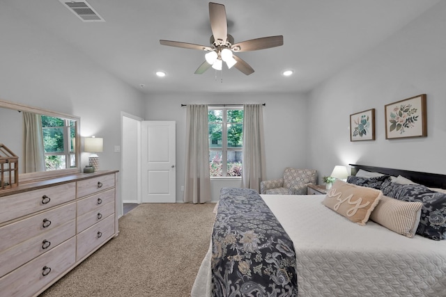 9040 Pecos Pl, Willis, TX 77378 - bedroom with multiple windows, carpet, recessed lighting, and ceiling fan