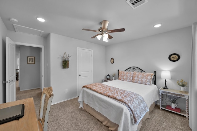 9040 Pecos Pl, Willis, TX 77378 - bedroom with carpet floors, recessed lighting, ceiling fan, baseboards, and attic access