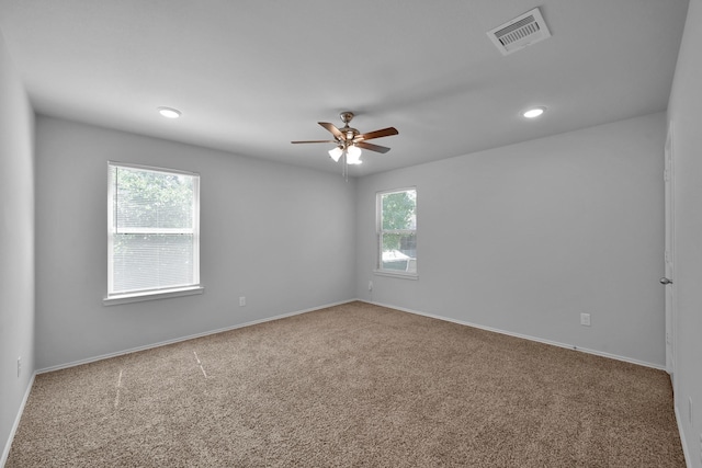 9040 Pecos Pl, Willis, TX 77378 - empty room with a ceiling fan, carpet floors, baseboards, and recessed lighting