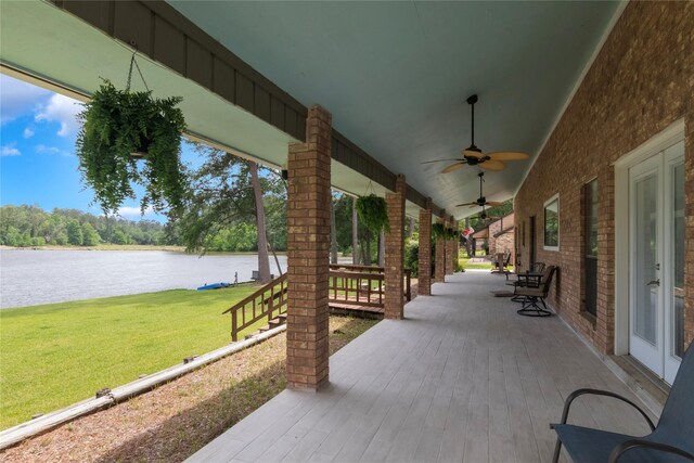 2207 Azalea Cir, Huntsville, TX 77340 - view of patio with a water view and ceiling fan