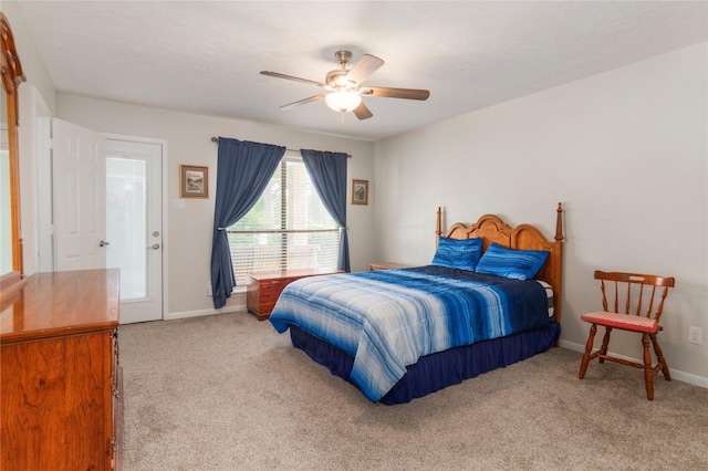 2207 Azalea Cir, Huntsville, TX 77340 - carpeted bedroom with baseboards and ceiling fan