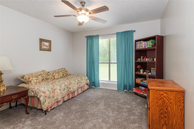 2207 Azalea Cir, Huntsville, TX 77340 - bedroom featuring carpet and a ceiling fan