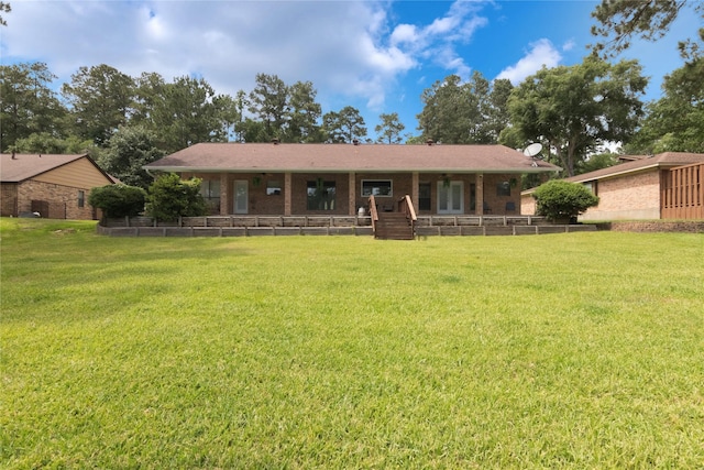 2207 Azalea Cir, Huntsville, TX 77340 - ranch-style home featuring a front lawn, covered porch, and brick siding