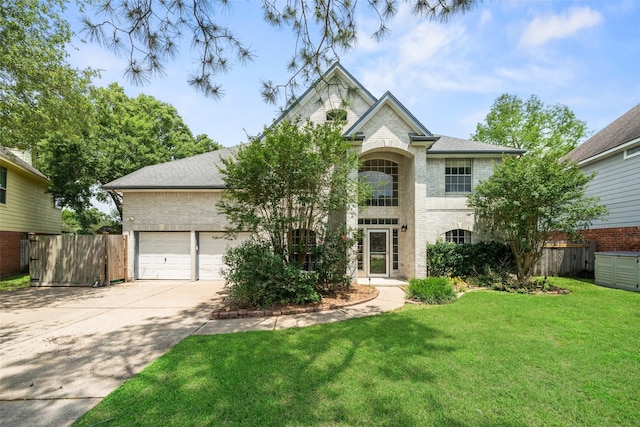 2502 Sea Horse Ct, Seabrook, TX 77586 - view of front of property with concrete driveway, a garage, and brick siding
