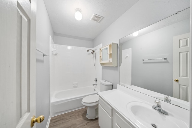 2502 Sea Horse Ct, Seabrook, TX 77586 - bathroom with wood finished floors, toilet,  shower combination, and vanity