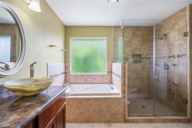 2502 Sea Horse Ct, Seabrook, TX 77586 - full bath with a garden tub, a stall shower, and vanity