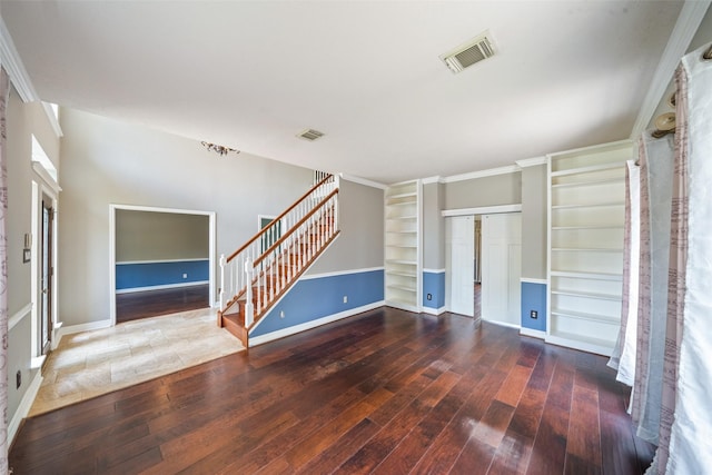2502 Sea Horse Ct, Seabrook, TX 77586 - unfurnished living room with stairway, hardwood / wood-style floors, baseboards, and built in shelves