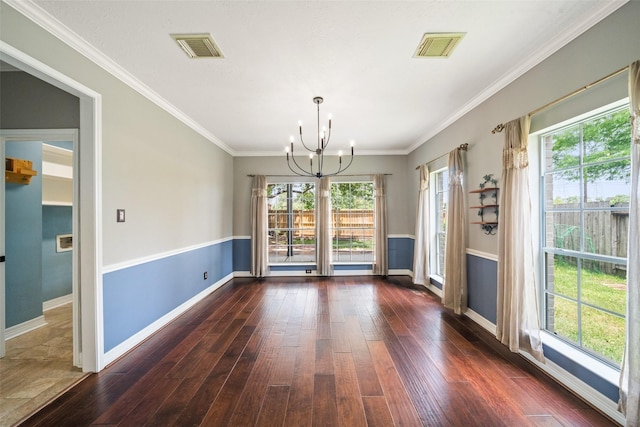 2502 Sea Horse Ct, Seabrook, TX 77586 - unfurnished dining area with a chandelier, dark wood-style floors, baseboards, and crown molding