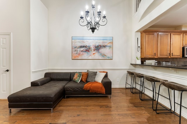 27 Medley Ln, The Woodlands, TX 77382 - living area with a chandelier and wood finished floors