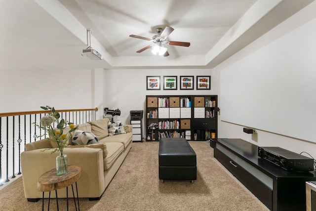 27 Medley Ln, The Woodlands, TX 77382 - carpeted living area featuring a ceiling fan and a raised ceiling