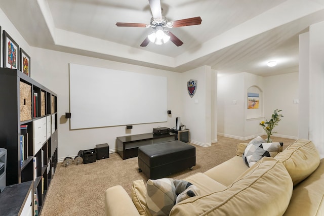 27 Medley Ln, The Woodlands, TX 77382 - carpeted home theater room featuring a tray ceiling and a ceiling fan
